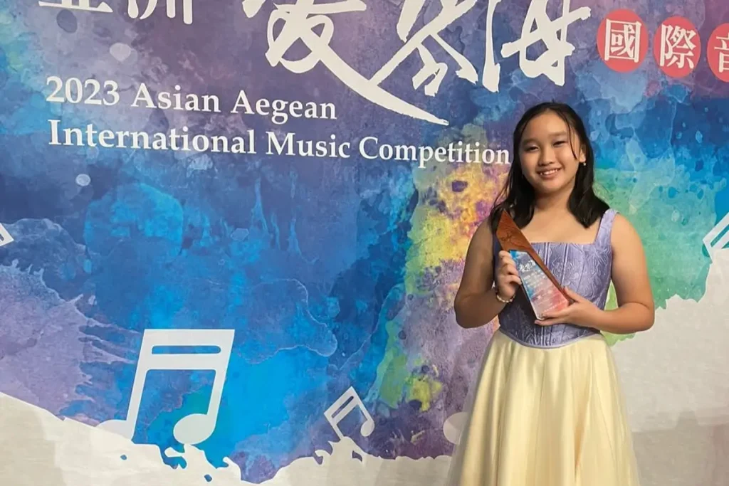 Charlize Evangeline Wins at AAIMC 2023