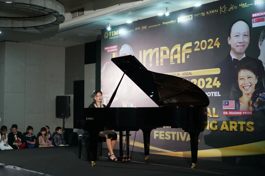 IMPAF Day 2 at Legian Room - a stunning piano performance from one of participant